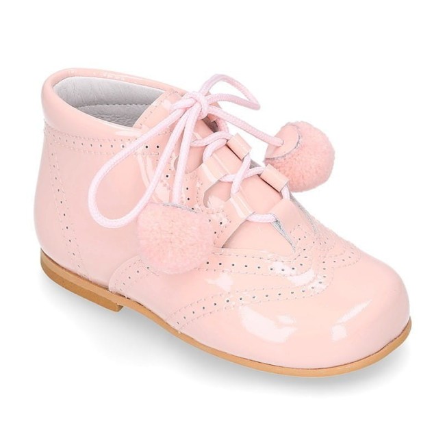 Przejdź do produktu Botki dziecięce skórzane różowe pompony Okaaspain r. 23